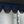 Bild tagen på frontgardin inuti lastbilshytt med blått tyg och svarta fransar